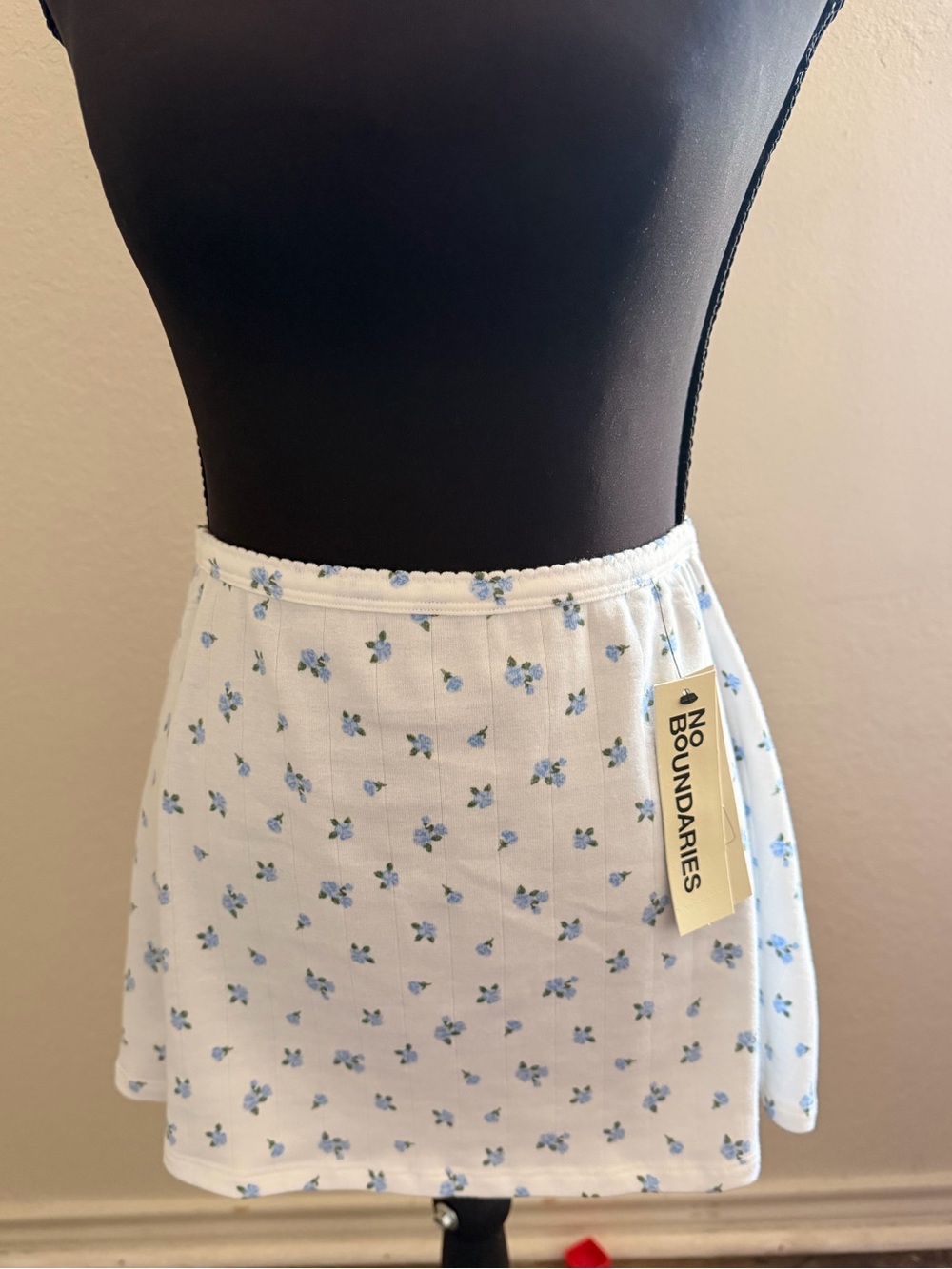 No Boundaries White Mini Skirt with Blue Floral Print